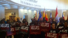 Live Free campaign supporters gathering in the Capitol rotunda before heading to the Cabinet meeting room.