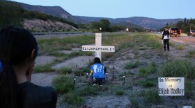 Elijah Hadley’s loved ones brought flowers to his memorial in the median of U.S. Highway 70.