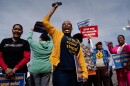 Erica Tolbert protesting outside the U.S. Postal Service 