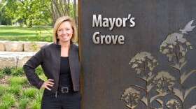 Rosalynn Bliss at the sign for Mayor's Grove Grand Rapids