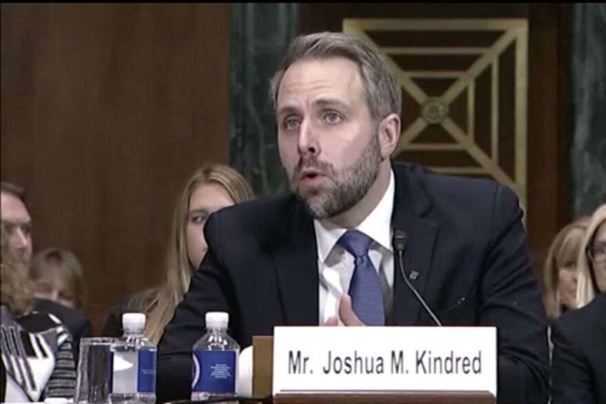 a man at a hearing