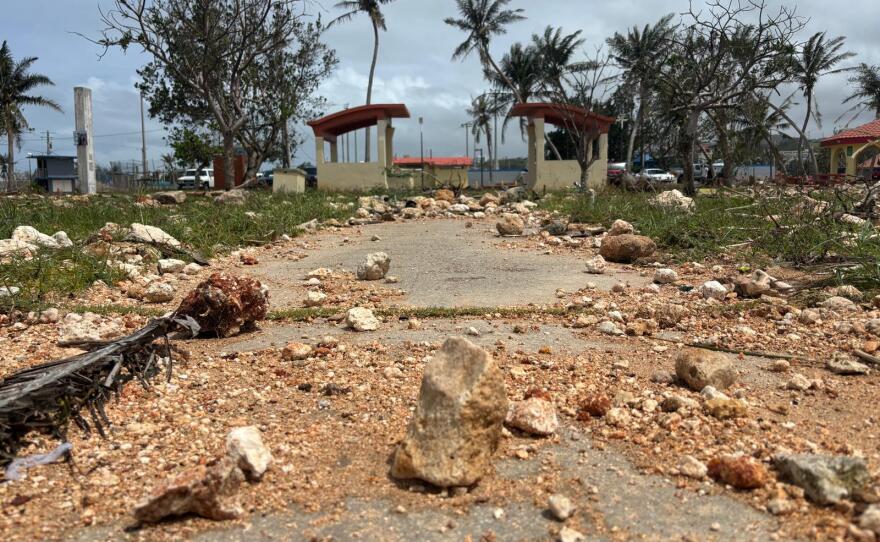 Large rocks line the path at Paseo in Hagatna following the passage of Super Typhoon Bavi on July 7, 2026.