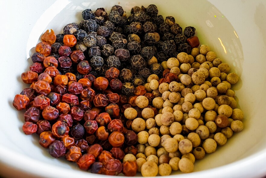 An array of red, black and white peppercorns produced at Kampot's La Plantation.