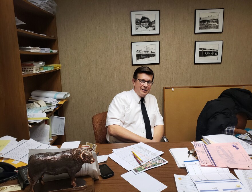 Federal Meats Supervisor Tom Benzin works early Saturday morning in his Buffalo, N.Y., office.