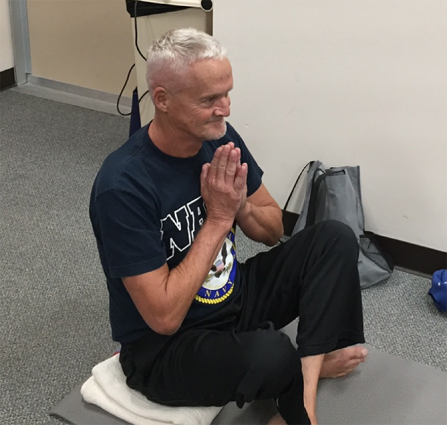 U.S. Navy veteran Larry Dodd says practicing yoga has already have positive effects on his health.