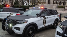 An Illinois State Police car is pictured outside the Illinois Capitol in Springfield during an event in 2022.