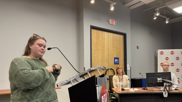 Clevelanders for Public Transit Co-Chair Jenna Thomas speaks at the Greater Cleveland Regional Transit Authority's public hearing on proposed service reductions on Monday, April 13th, 2026.