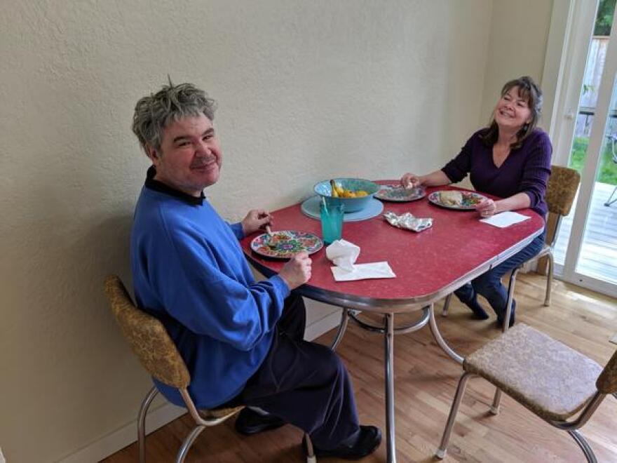 Dawn Akerman and her brother Fred pose while having lunch together before he returned to the hospital in June.