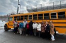 Chicopee School Superintendent Dr. Marcus Ware stands with school department and transportation employees as well as Chicopee Treasurer Marie LaFlamme to highlight new bus stop arm safety program.
