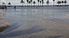 Water from king tide receding