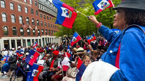 Eliane Garber, of Randolph, was among those who attended a Haitian flag-raising ceremony at Boston City Hall in May. (Simón Rios/WBUR)