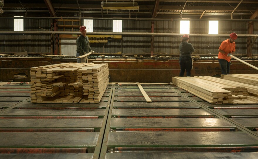 Workers sorting lumber at Pyramid