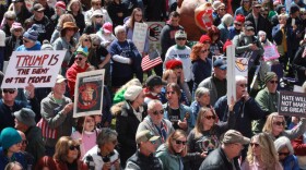 People filled the Indiana Statehouse lawn opposing Donald Trump Saturday, March 28, 2026.