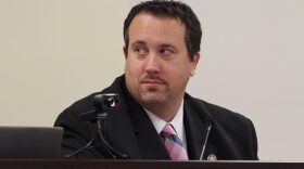 State Rep. Seth Grove (R-York) looks on as a fellow lawmaker speaks at a meeting of the House State Government committee on Jan 10, 2022. (Sam Dunklau / WITF)