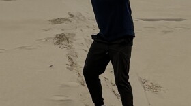 The host on his first successful sand surf run.