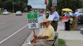 Anti-abortion protesters outside Jacksonville's only Planned Parenthood.