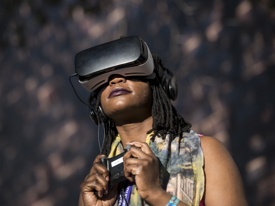 An attendee tries a Samsung Gear VR headset during the South By Southwest Interactive Festival in Austin, Texas, on March 12.
