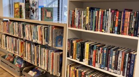 Bookshelves line the walls of the new Friends’ Books & Music store by Friends of the Library of Hawai‘i in Kakaʻako on Oʻahu.