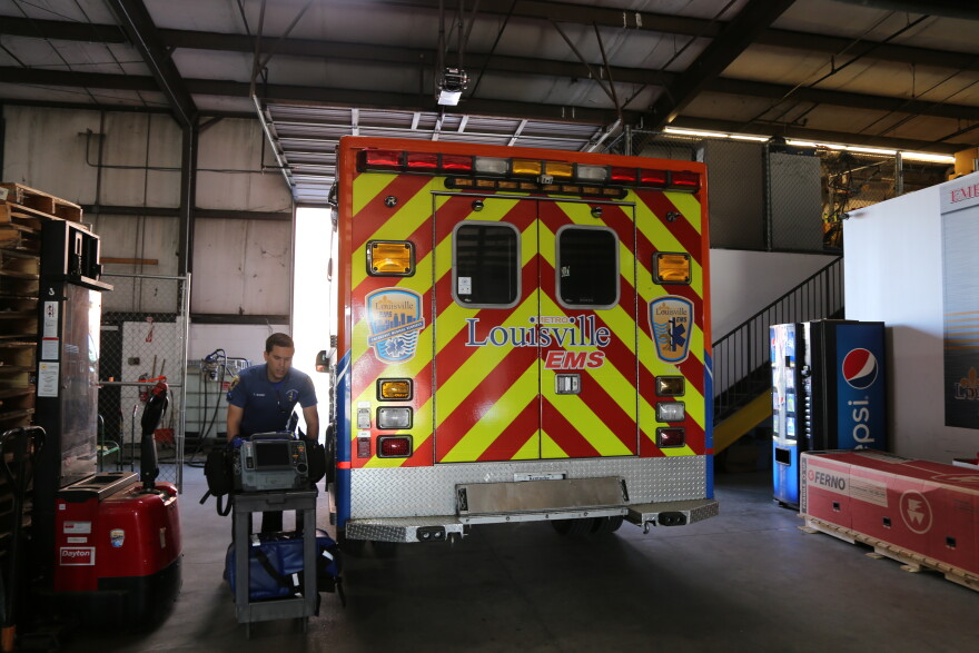 A Louisville EMS medical first responder prepares for his shift.