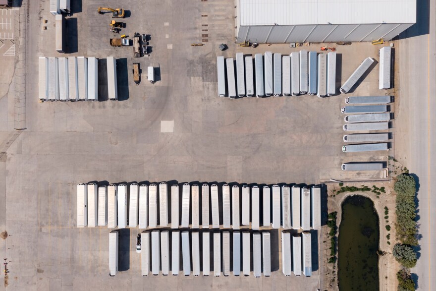Trailers sit idle in a drone view of the Cargill meatpacking plant Wednesday, July 22, 2026, in Fort Morgan. The company has locked out its workers and shuttered its plant as Teamsters Local Union 455 fights for a new contract.