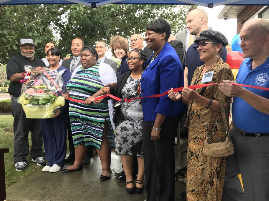 Autism Council joins local officials to cut the ribbon.