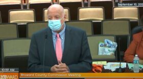 Supervisor of Elections Peter Antonacci appears before the Broward County commission on Sept. 10, 2020. He predicted turnout in the November election could hit 75%, a record for Broward County. Looking on is County Administrator Bertha Henry in the commission chambers nearly empty because of Covid-19 precautions.