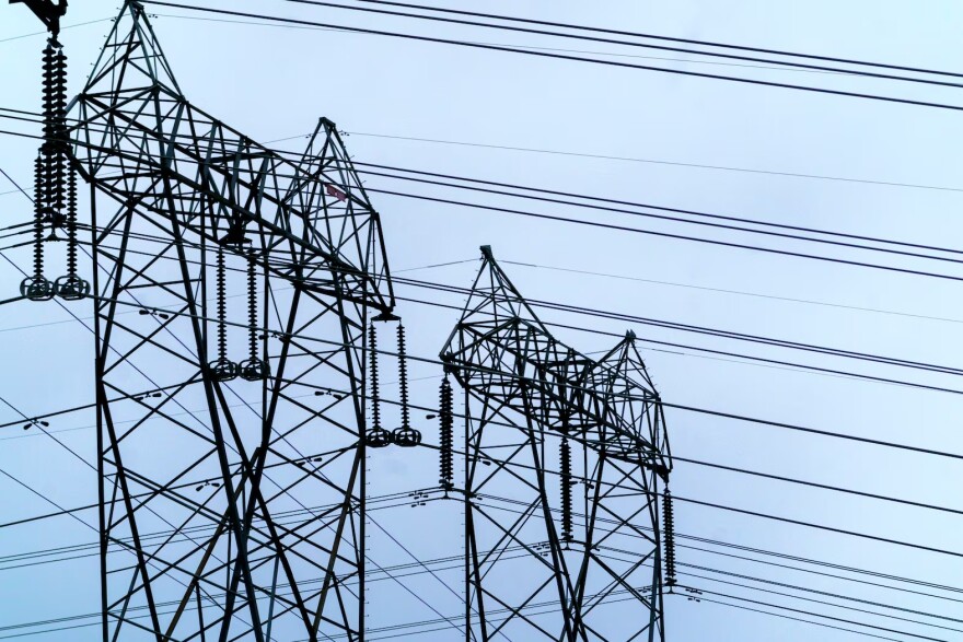 FILE - Transmission towers at Bonneville Power Administration’s Earl D. Ostrander Substation near Eagle Creek, Jan. 5, 2023.