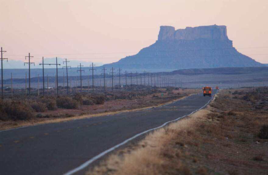 School buses carry children across the vast Navajo Nation south of Rock Point on the Navajo Indian Reservation, Arizona. (David McNew/Getty Images)