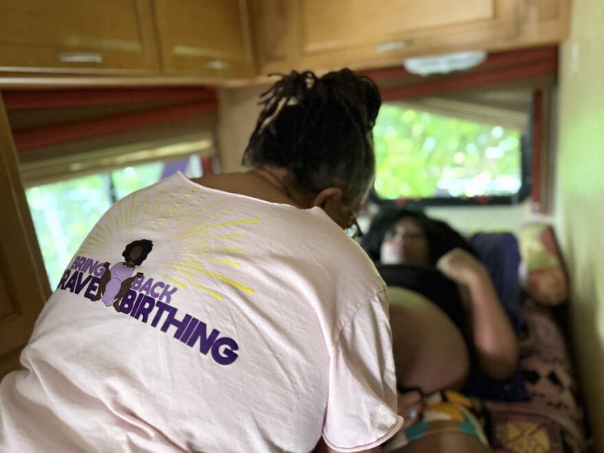 Midwife Sheila Simms Watson treats Isis Daaga during a pregnancy checkup at the Southern Birth Justice Network’s mobile midwifery clinic in Miami on March 21.