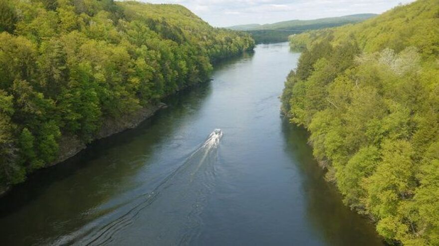 The Connecticut lined by trees in part of Massachusetts