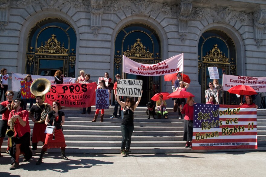 March 3 is International Sex Workers' Rights Day. This protest took place in 2008 on the steps of San Francisco's city hall. The red umbrella symbolizes protection from violence.