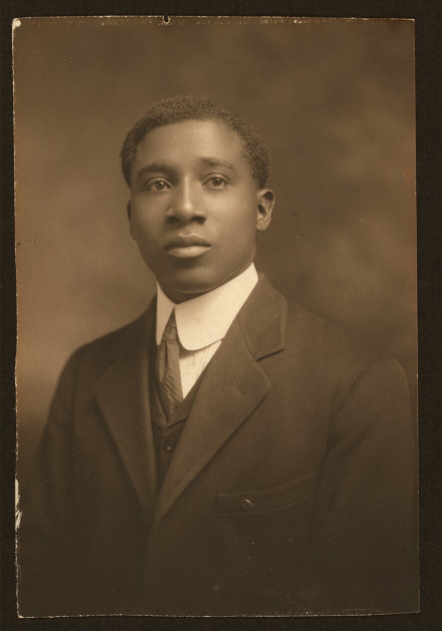 Formal portrait photo of R. Nathaniel Dett, wearing a suit