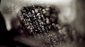 When raindrops approach the front windshield, they are too heavy and are going too fast to suddenly change direction and be swept up and away from the glass.