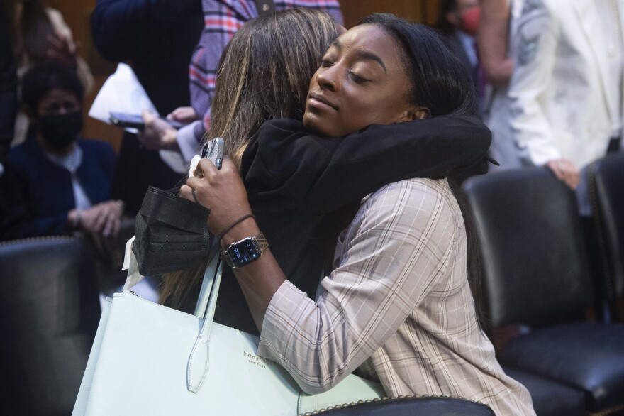 United States gymnasts Kaylee Lorincz and Kaylee Lorincz hug after a Senate Judiciary hearing about the Inspector General's report on the FBI's handling of the Larry Nassar investigation on Capitol Hill, Wednesday, Sept. 15, 2021, in Washington. Nassar was charged in 2016 with federal child pornography offenses and sexual abuse charges in Michigan. He is now serving decades in prison after hundreds of girls and women said he sexually abused them under the guise of medical treatment when he worked for Michigan State and Indiana-based USA Gymnastics, which trains Olympians. (Saul Loeb/Pool via AP)