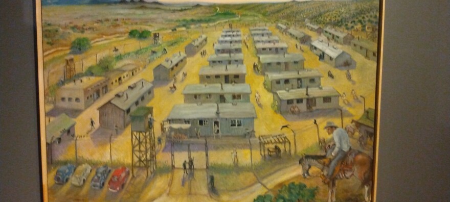 Jerry West oil painting of the Santa Fe Internment Camp on display at the NM History Museum exhibit. His father and uncle were both guards at the camp.