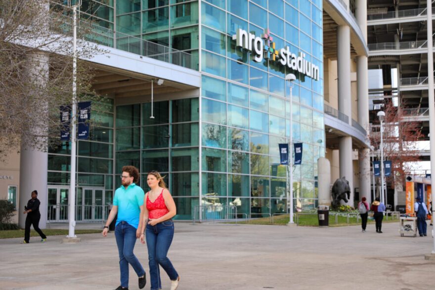 People walking outside the NRG stadium at the Houston Livestock Show & Rodeo.