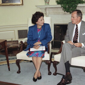 U.S. President George H. Bush meets with Small Business Administration Administrator Pat Saiki, Thursday, Sept. 3, 1992 in the Oval Office of the White House. The meeting was to discuss hurricane relief efforts in Florida and Louisiana.