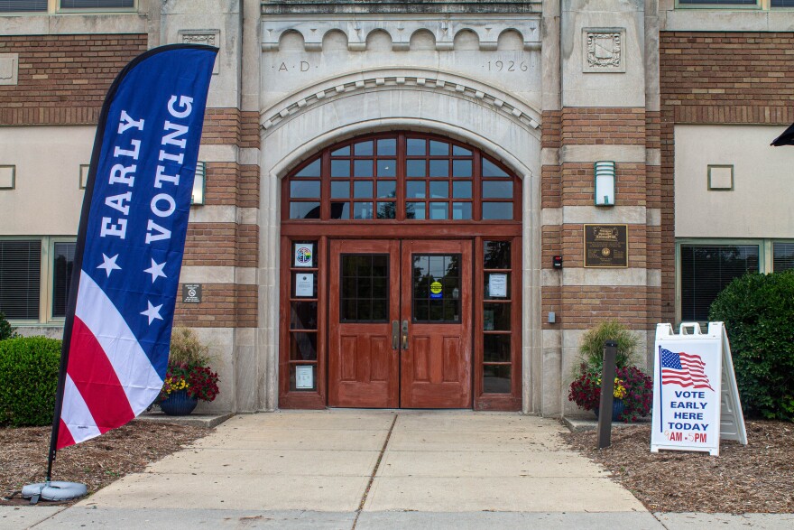 Hannah Community Center with an early voting flag and sign.