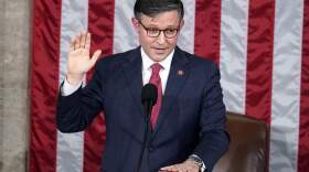 Rep. Mike Johnson, R-La., takes the oath to be the new House speaker. (Alex Brandon/AP)