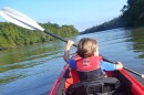 A boy kayaking on the Apalachicola River