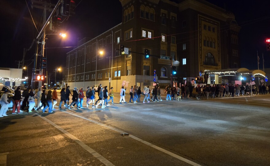 Protesters march to the Federal Courthouse in Springfield, Mo. on January 8, 2026, after the killing of Renee Good.