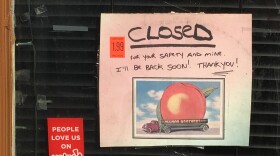 A sign on the door of Electric EYE Records in Florence, Massachusetts, which is closed amid the COVID-19 pandemic.