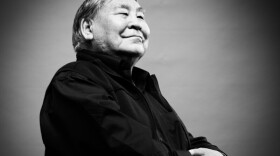 A black and white portrait of a man