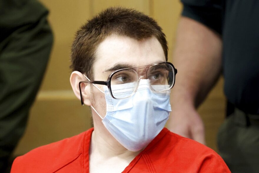 Marjory Stoneman Douglas High School shooter Nikolas Cruz is shown at the defense table during a hearing at the Broward County Courthouse in Fort Lauderdale, Fla. on Tuesday, Feb. 2, 2022. Cruz previously plead guilty to all 17 counts of premeditated murder and 17 counts of attempted murder in the 2018 shootings.