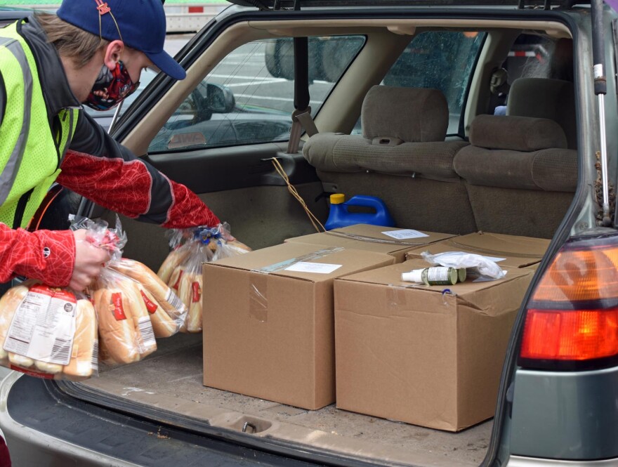 Loading a car with food