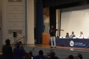 Cleveland Mayor Justin Bibb, right, responds to questions from Cleveland Councilmember Kevin Conwell during a town hall at Collinwood High School.
