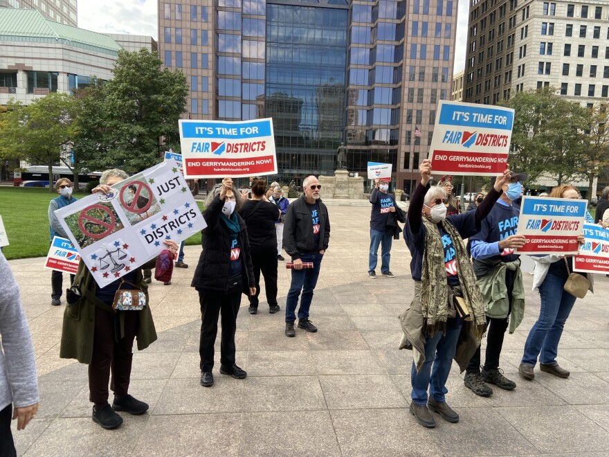 Activists with Fair Districts Ohio protested outside the Statehouse in October 2021. The following month, a Congressional map that experts say would favor Republicans in 12 of 15 Congressional districts was approved by Republicans and signed by Gov. Mike DeWine. 