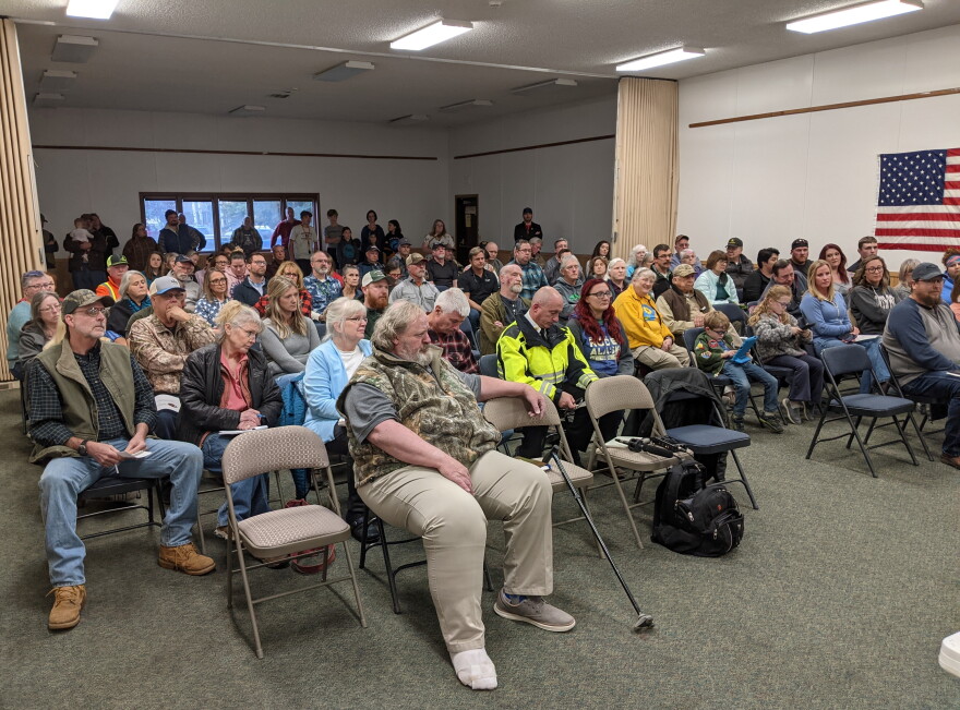 More than 100 people turned out for the standing-room only meeting at the Delta Community Center.