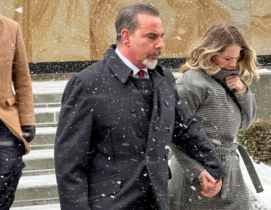 Joseph Bongiovanni, left, leaves federal court with his wife, Lindsay Bongiovanni, after being sentenced to 5 years in prison on corruption charges, Wednesday, Jan. 21, 2026, in Buffalo, N.Y.