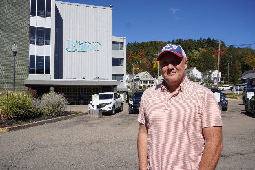 Gregory Spako stands in front of The Pavilion, a skilled nursing facility in Bradford, Pa. Spako wants to raise awareness about the quality of the facility and its staff in hopes of either preventing its closure or bringing back care someday. 